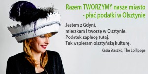 Plakat akcji Płać podatki w Olsztynie